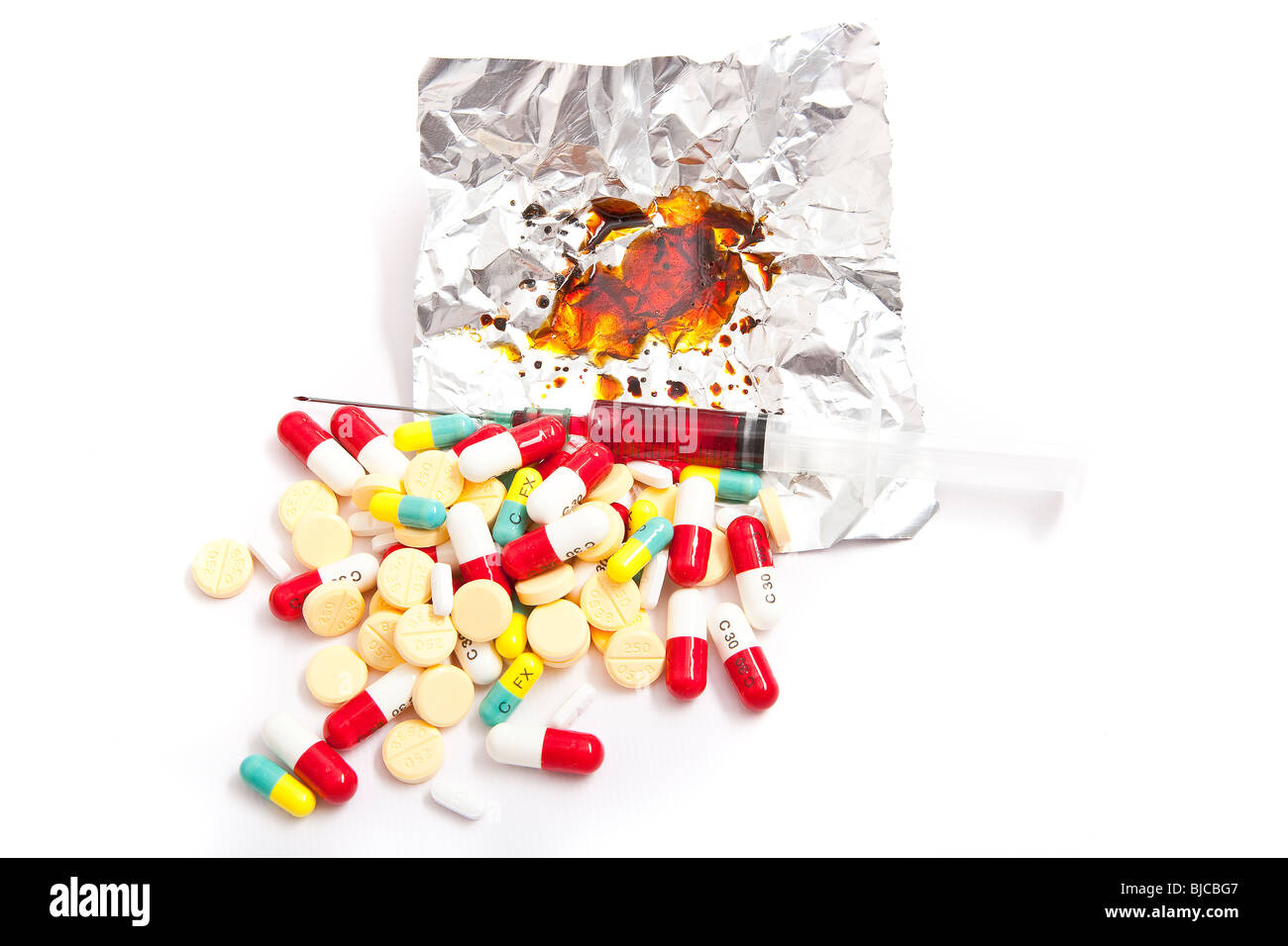 Pillole medicinali, Drug paraphernalia attrezzature prodotti o materiali utilizzati per l'uso illegale di droga Foto Stock