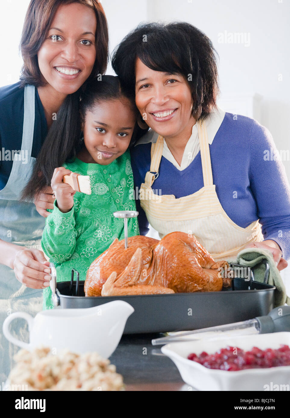 Famiglia nero preparazione cena di ringraziamento Foto Stock