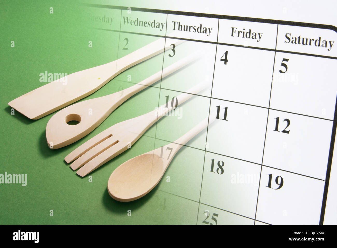 Calendario e utensili da cucina Foto Stock