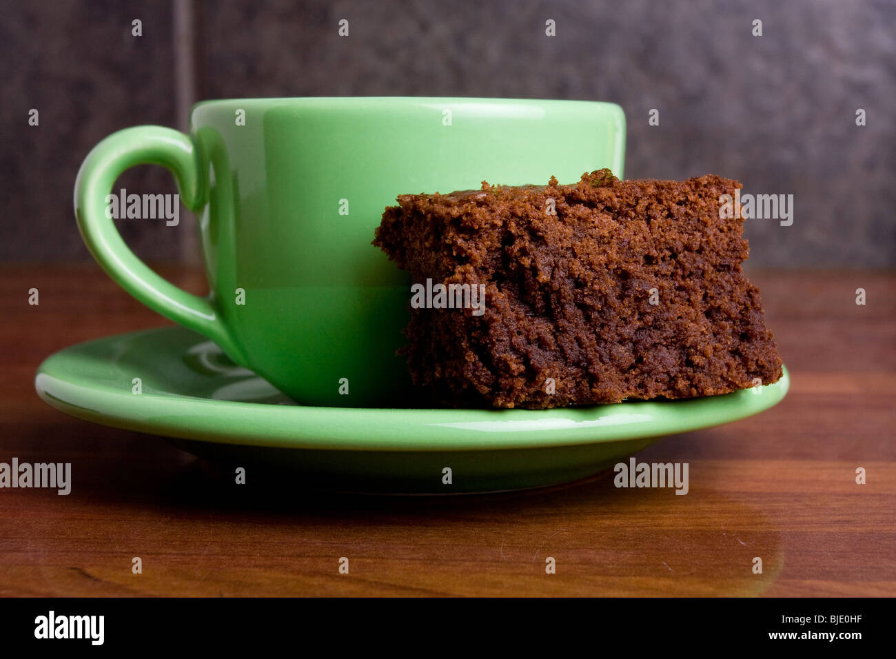 Salsa al cioccolato brownie con tazza di caffè espresso Foto Stock