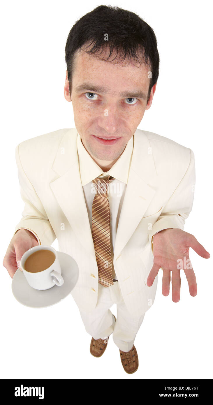 Un giovane uomo in un abito bianco con un caffè Foto Stock