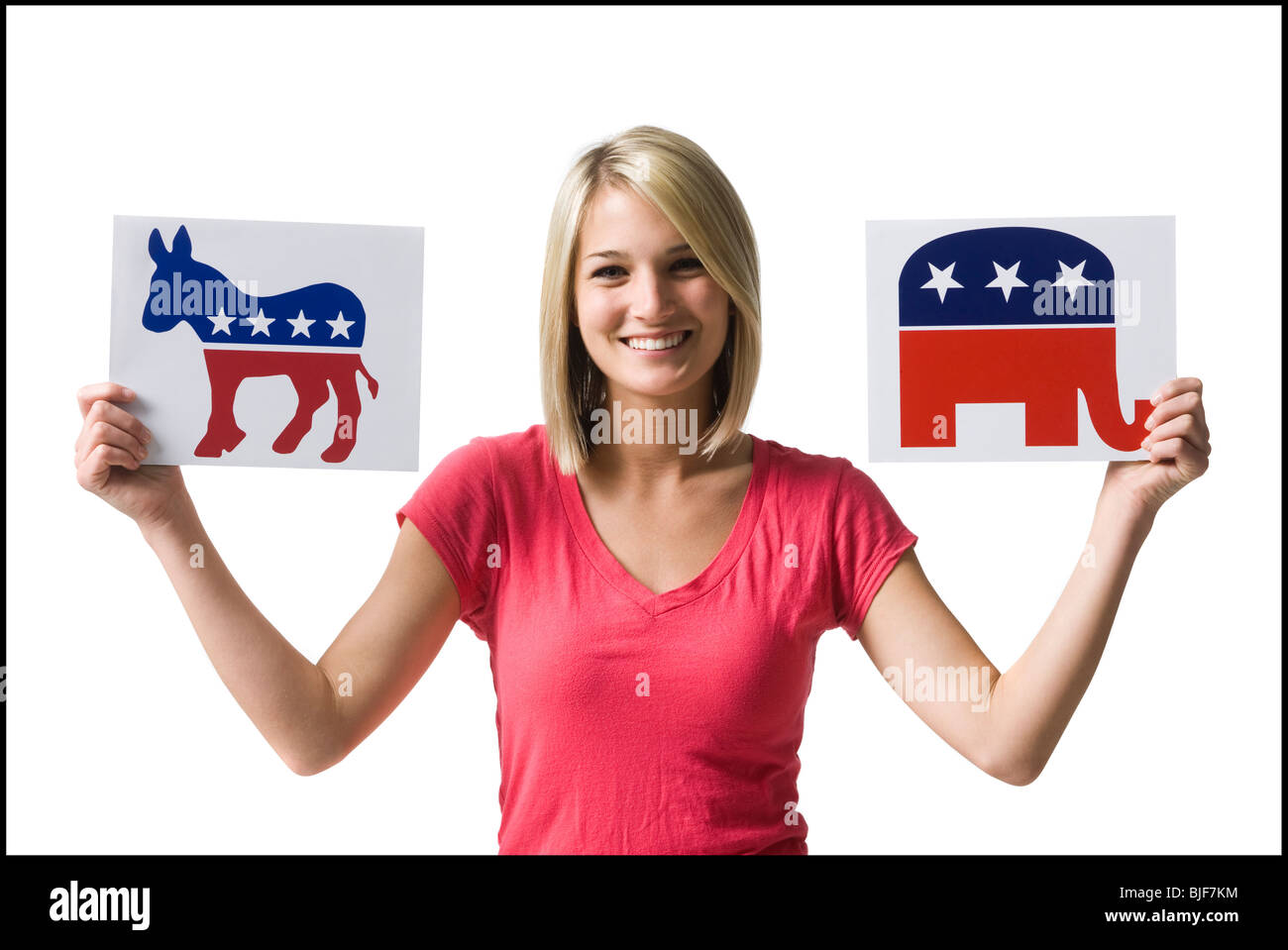 Donna che mantiene fino partito politico segni Foto Stock