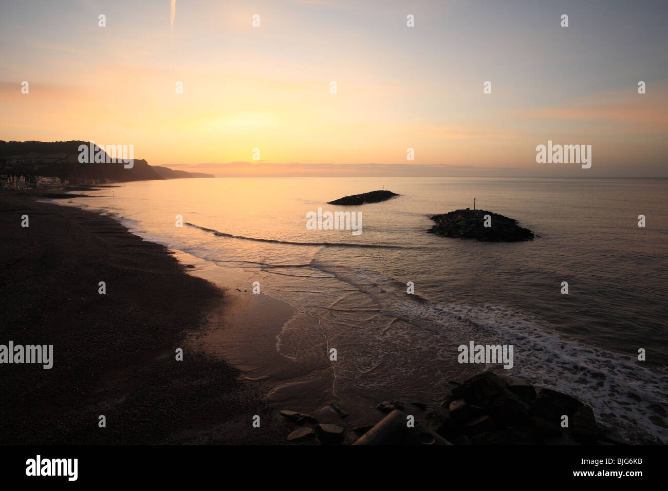 Sunrise over Lyme Bay visto da Sidmouth, East Devon, Inghilterra, Regno Unito Foto Stock