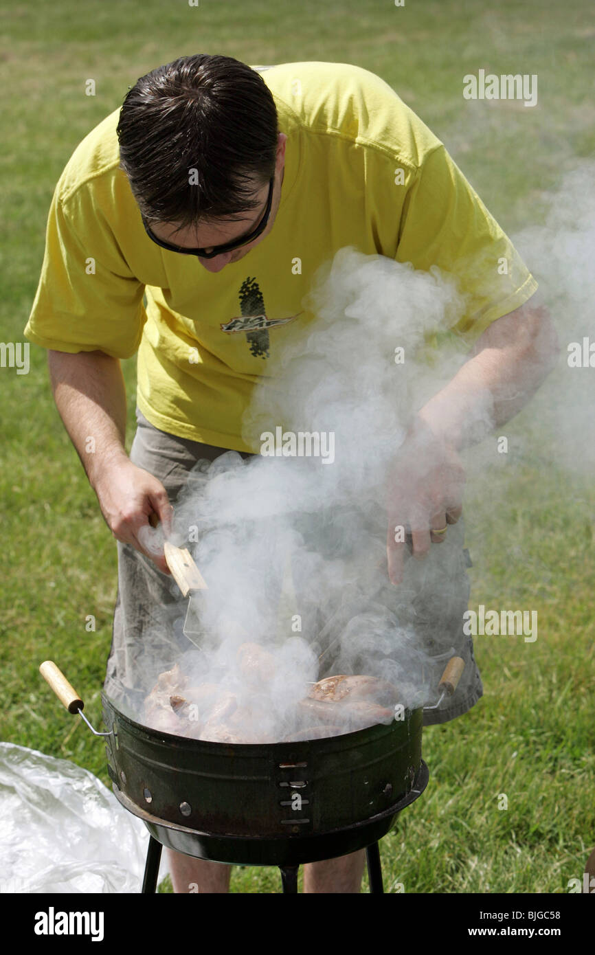 L'uomo la grigliatura, Epsom, Gran Bretagna Foto Stock