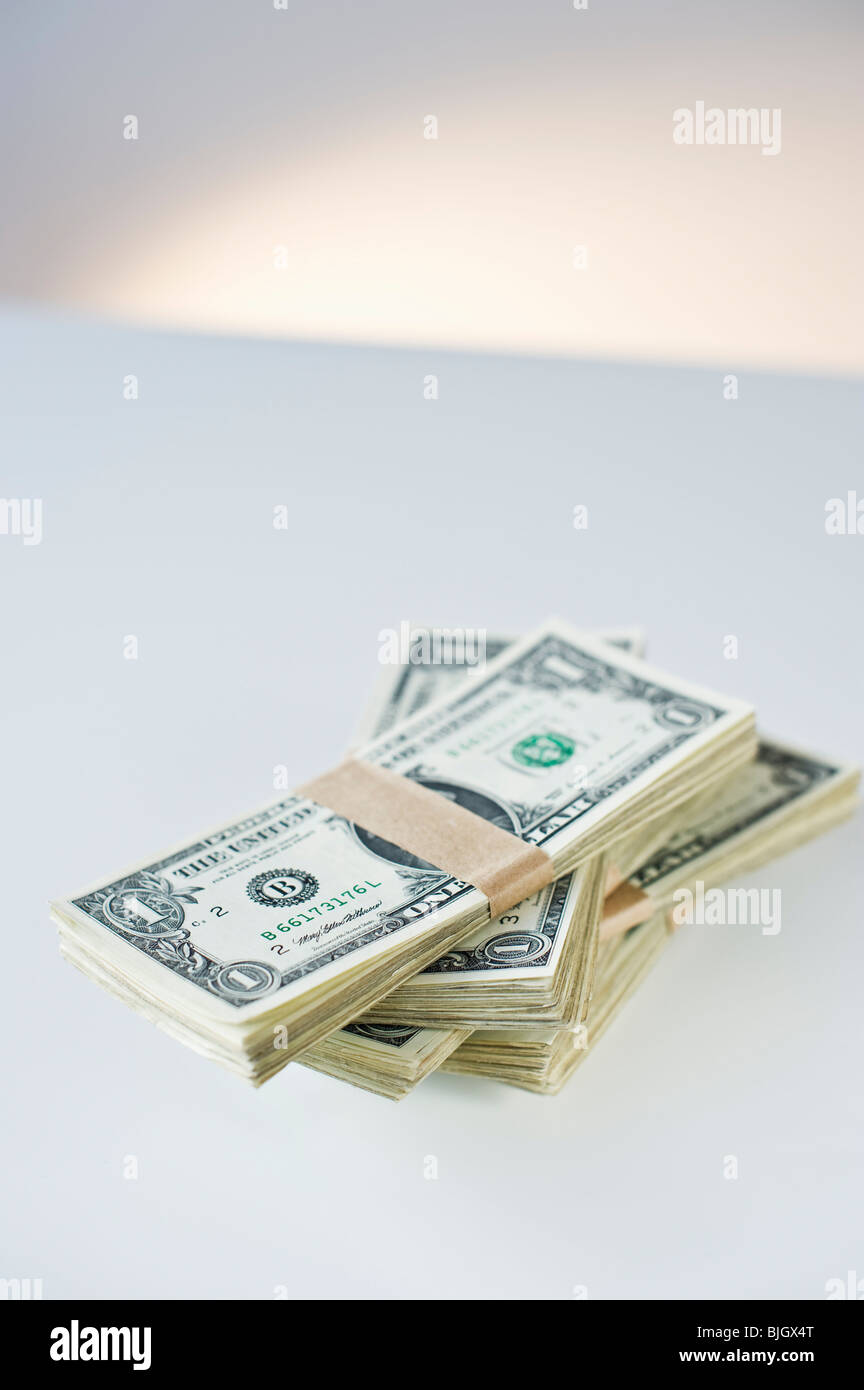 Pile di soldi Foto Stock