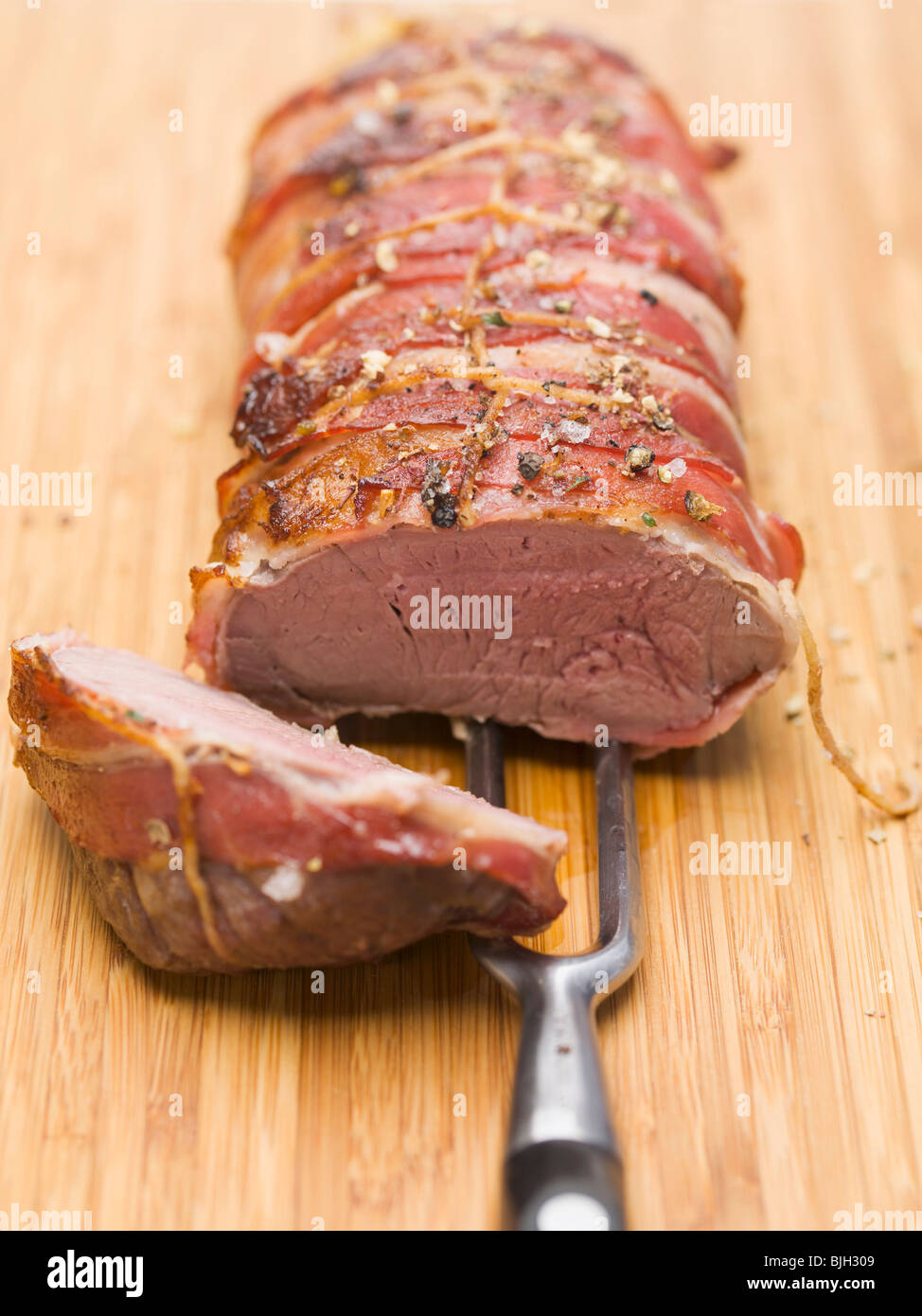 Bacon-gamba avvolta di cervo - Foto Stock