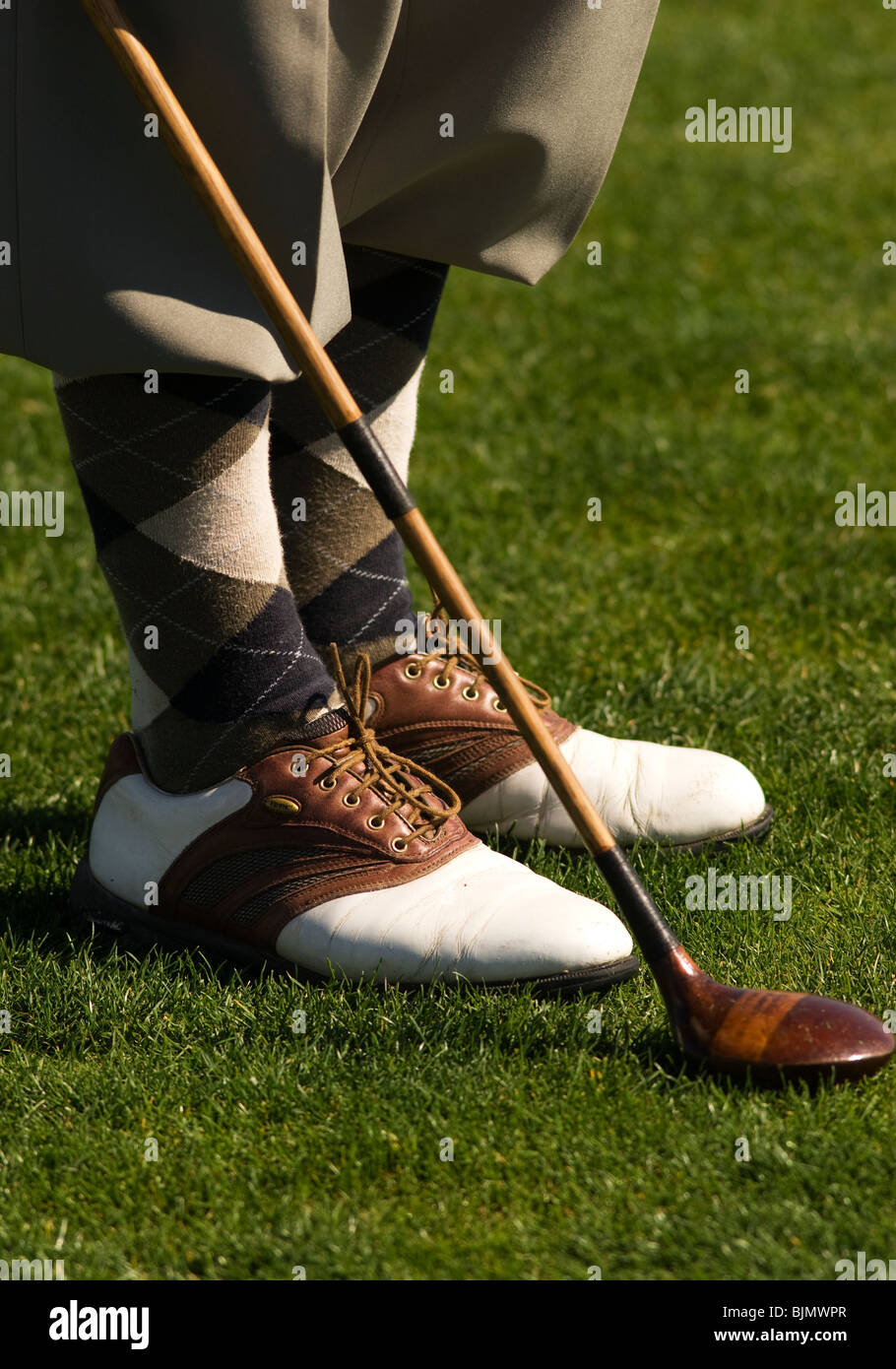 Hickory golf club, sfere e abbigliamento Foto stock - Alamy