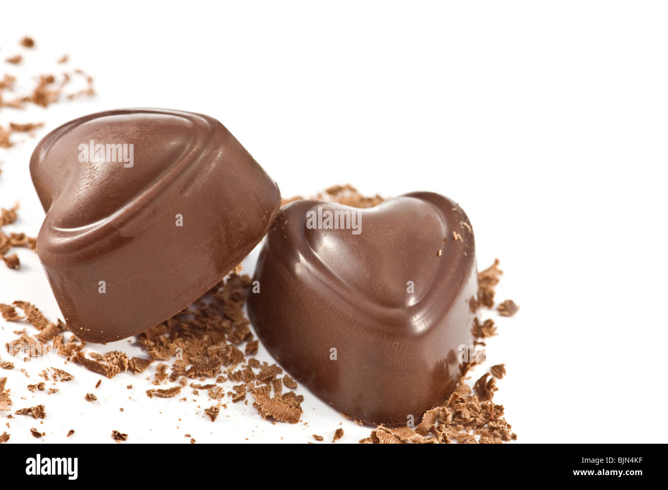 Due caramelle di cioccolato isolato su bianco Foto Stock