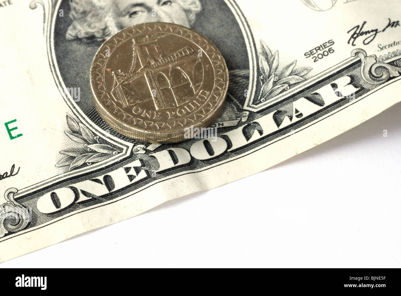 Close up di un dollaro e una libbra Foto Stock