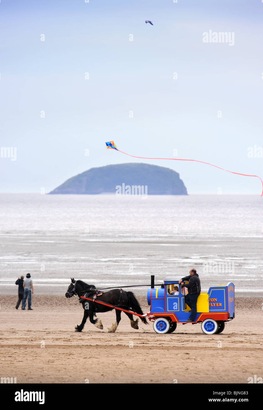 Pony e il carrello scorre a Weston-Super-Mare, Somerset REGNO UNITO Foto Stock