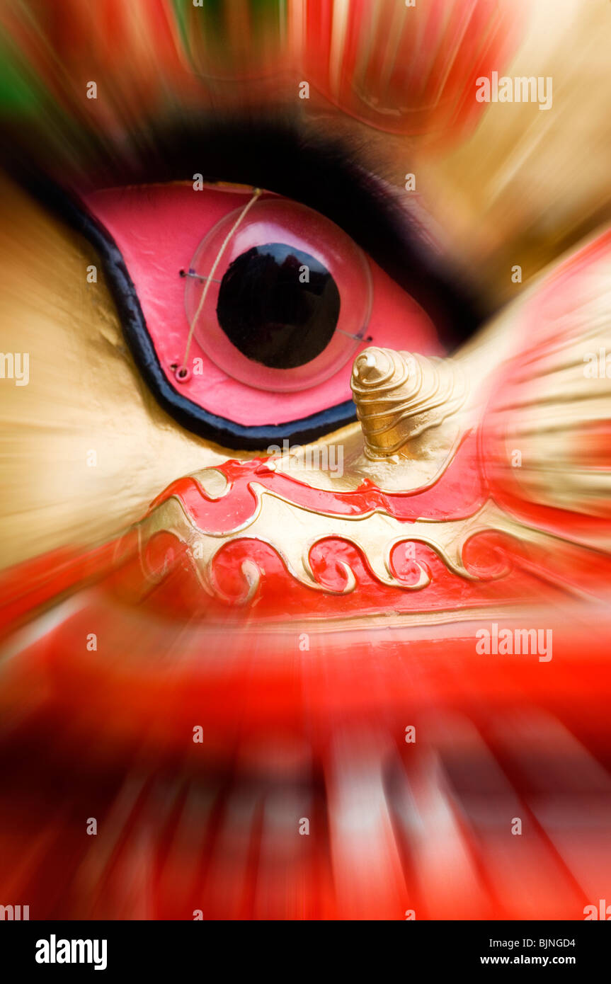 Primo piano del drago occhio nel nuovo anno cinese festival in Manchester REGNO UNITO Foto Stock