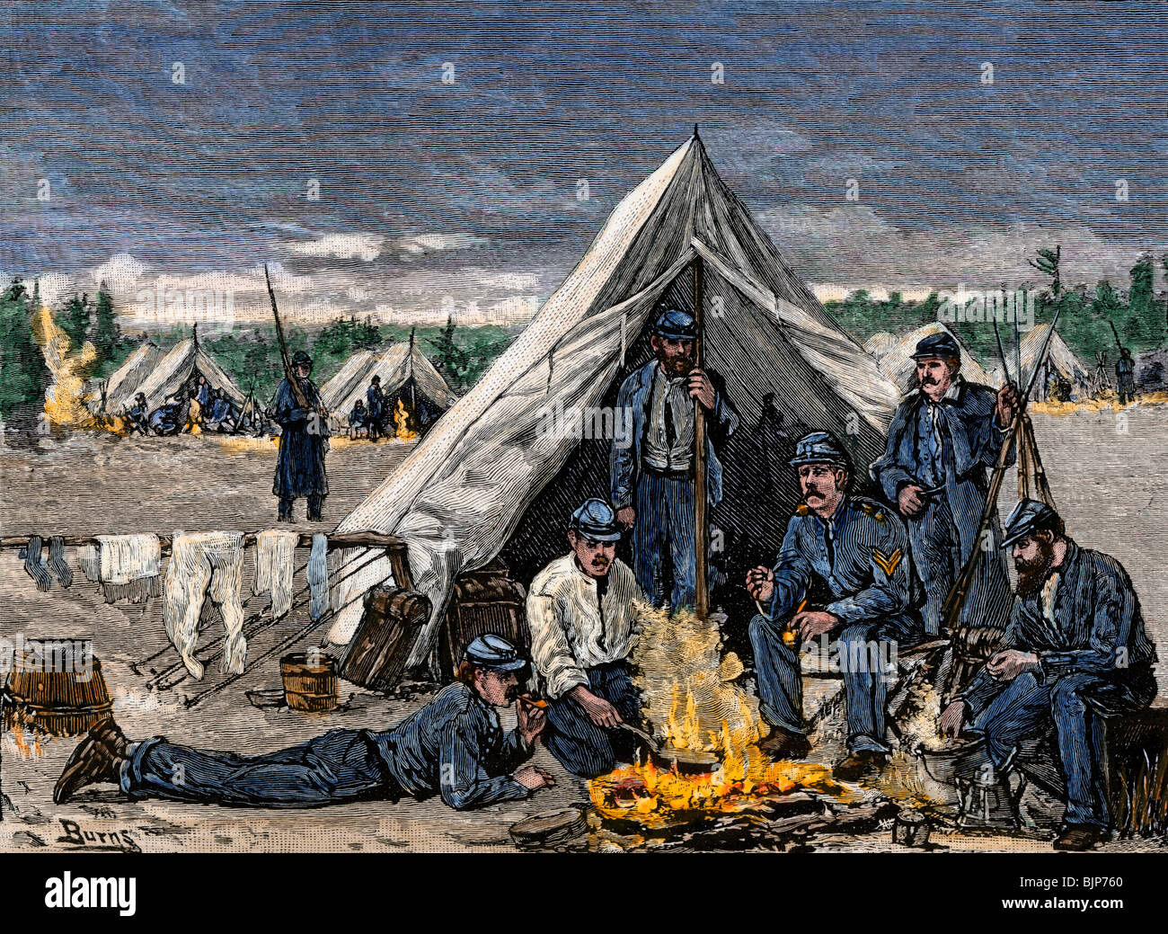 I soldati della settima New York reggimento intorno a un falò presso il Camp Cameron, Washington DC. Colorate a mano la xilografia Foto Stock