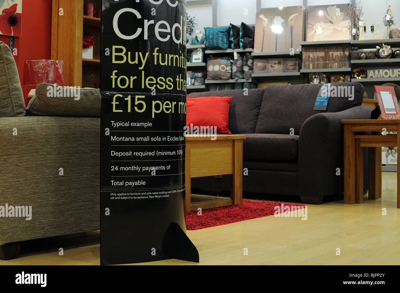 Il credito in un prossimo negozio Foto Stock