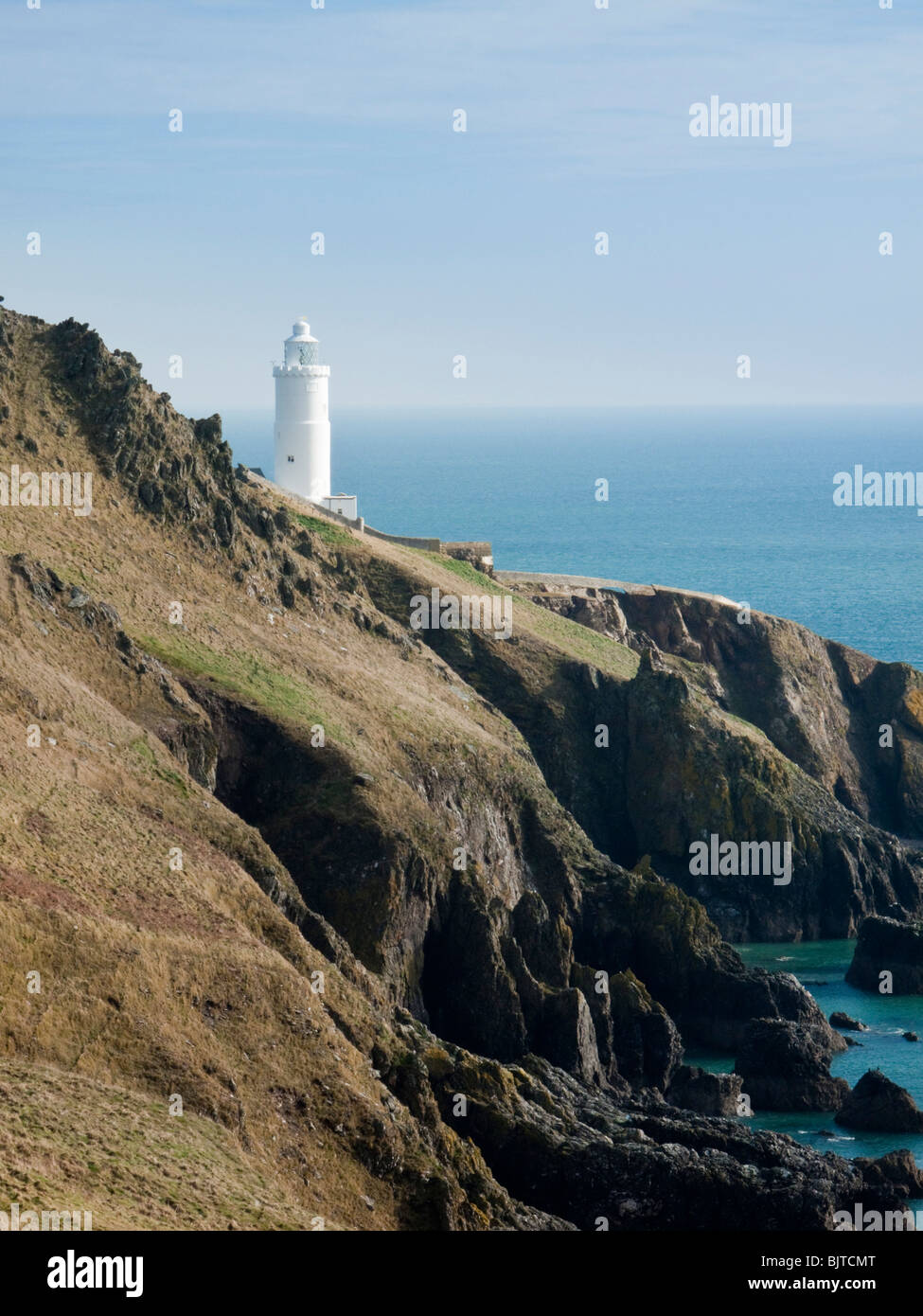Punto di partenza il faro in South Devon. Foto Stock