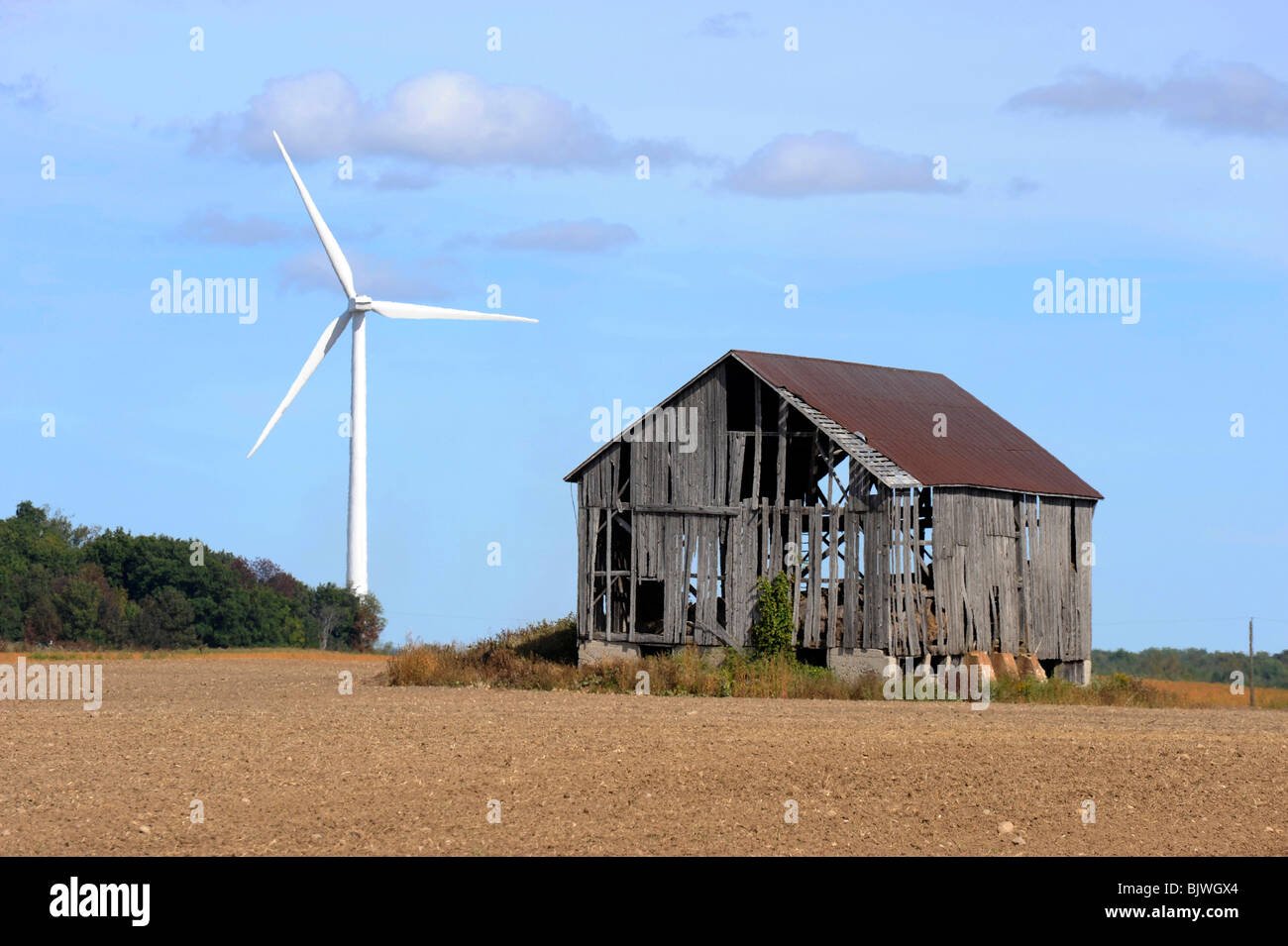 Mulino a vento mulino generare generatore di generazione di equilibrio il conservatorismo conservare ecosistema ecologia ambiente ambientali Foto Stock