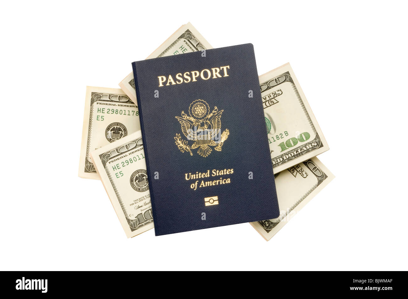 Il passaporto americano con denaro su bianco Foto Stock