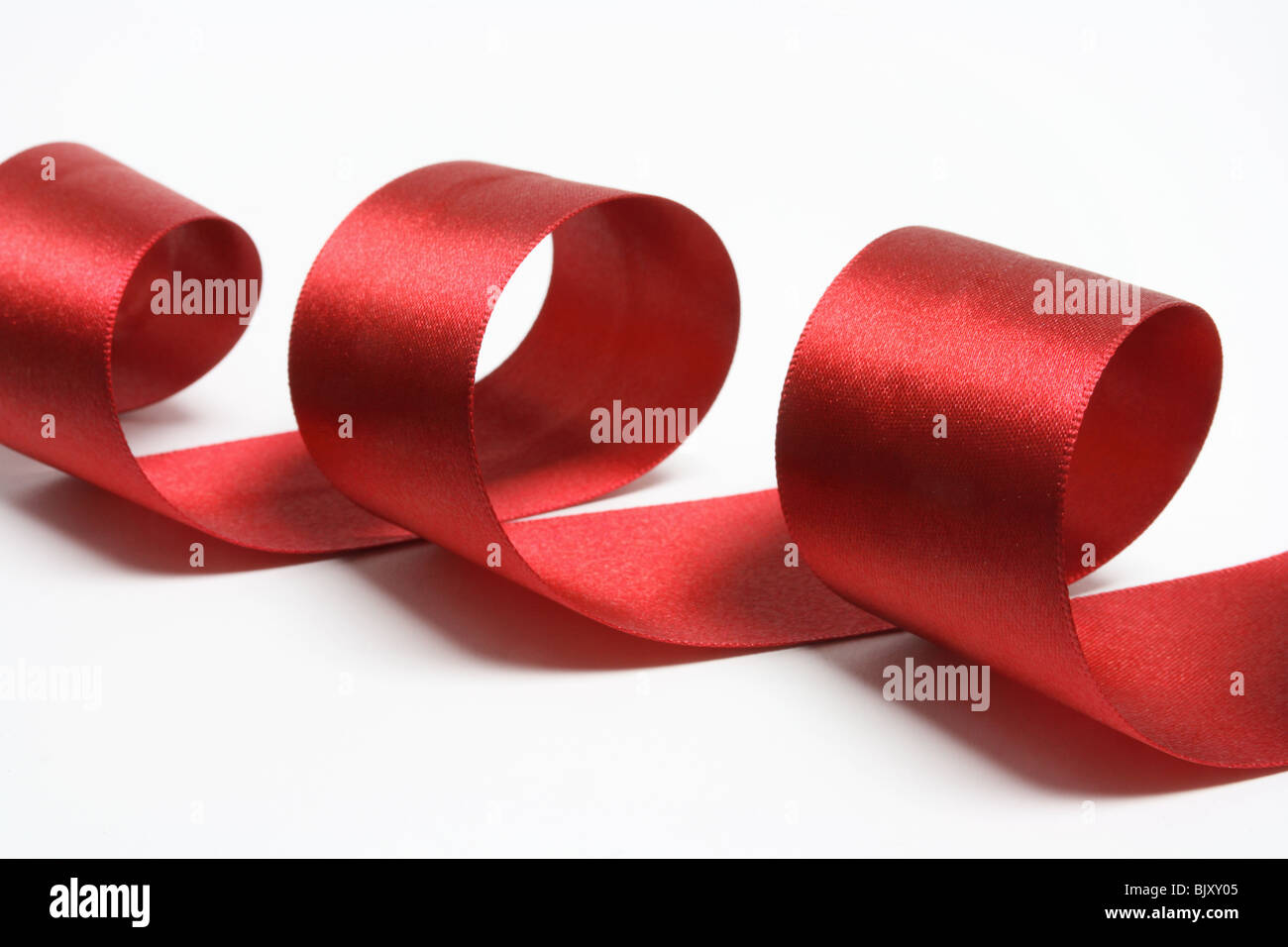 Rosso di Curling nastro regalo Foto Stock