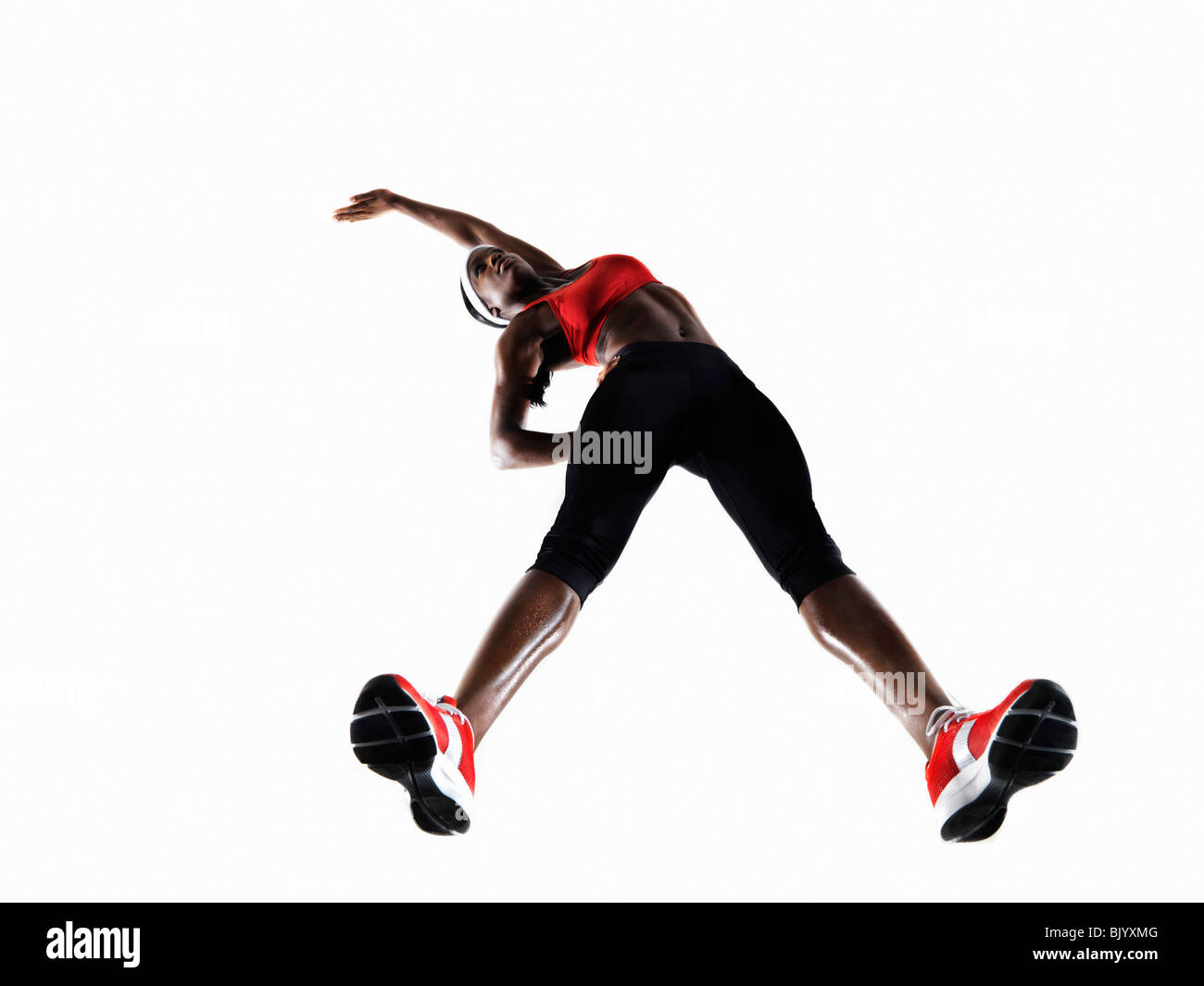 Atleta femminile Stretching Foto Stock