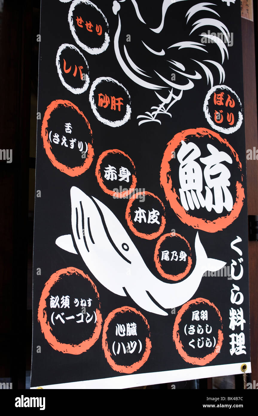 Ristorante segno pubblicità carne di balena e di pollo su di esso del menu Foto Stock