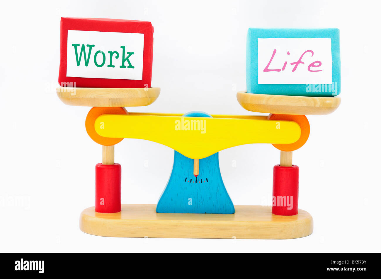 Bilancia con pacchetti contrassegnati "lavoro" e "vita" Foto Stock