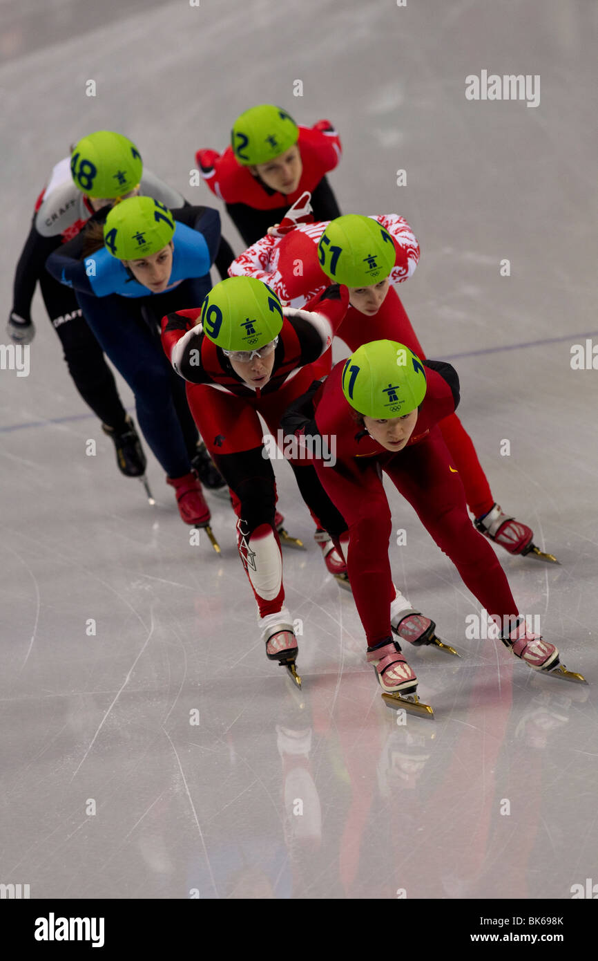 Concorrenti nel 1000m Short Track pattinaggio di velocità degli eventi presso il 2010 Giochi Olimpici Invernali Foto Stock