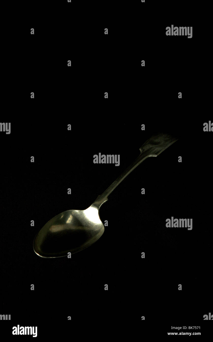 Un cucchiaio d'argento. Foto Stock
