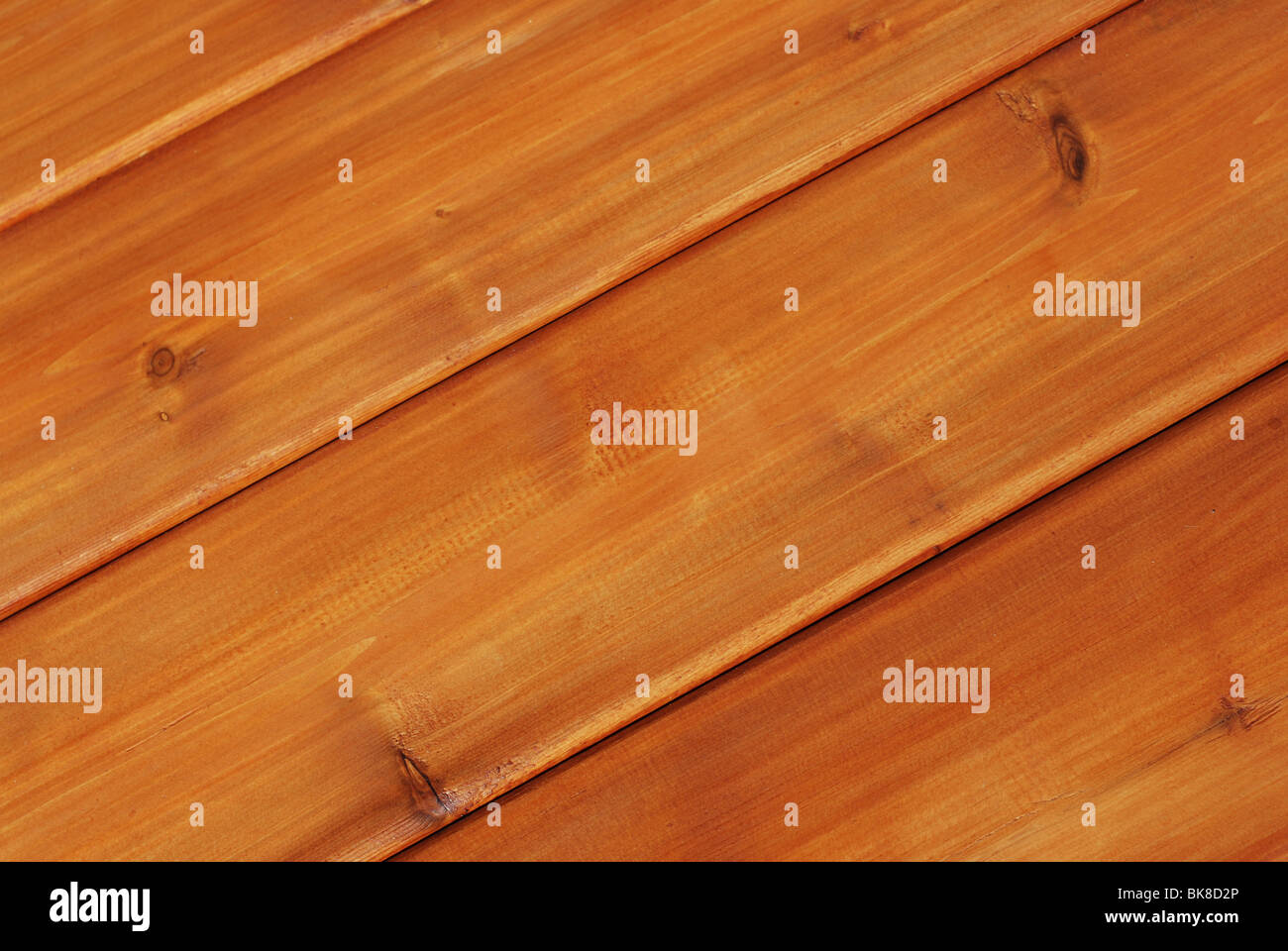 Pannelli di legno colorati in un colore rossastro Foto Stock