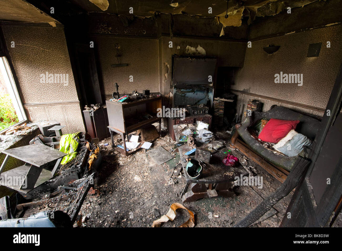 Bruciata lounge a seguito di un grave incendio Foto Stock