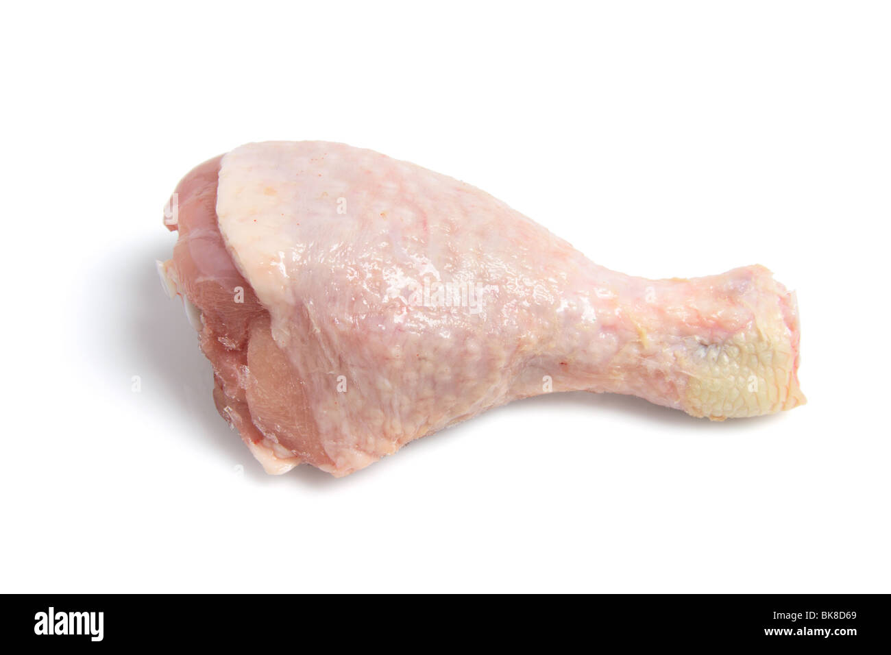 Il pollo crudo coscia Foto Stock