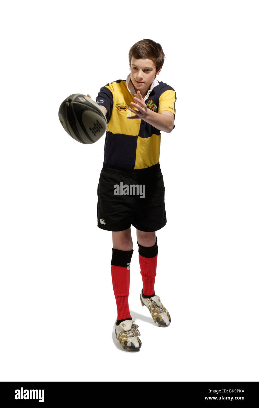 Ragazzo con una palla da rugby Foto Stock