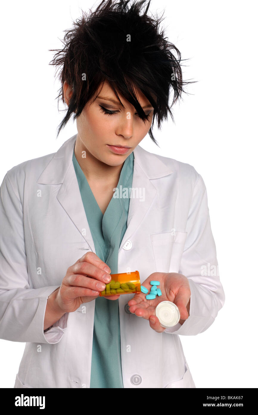 Assistenza sanitaria professionale tenendo la prescrizione pillole isolate su sfondo bianco Foto Stock