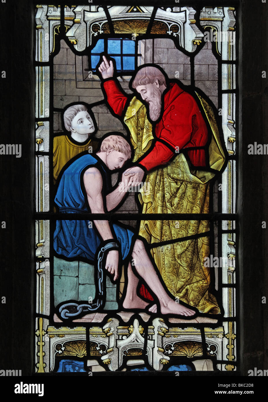Una vetrata raffigurante una volta del caporale atti di misericordia, visitando i prigionieri, Foto Stock