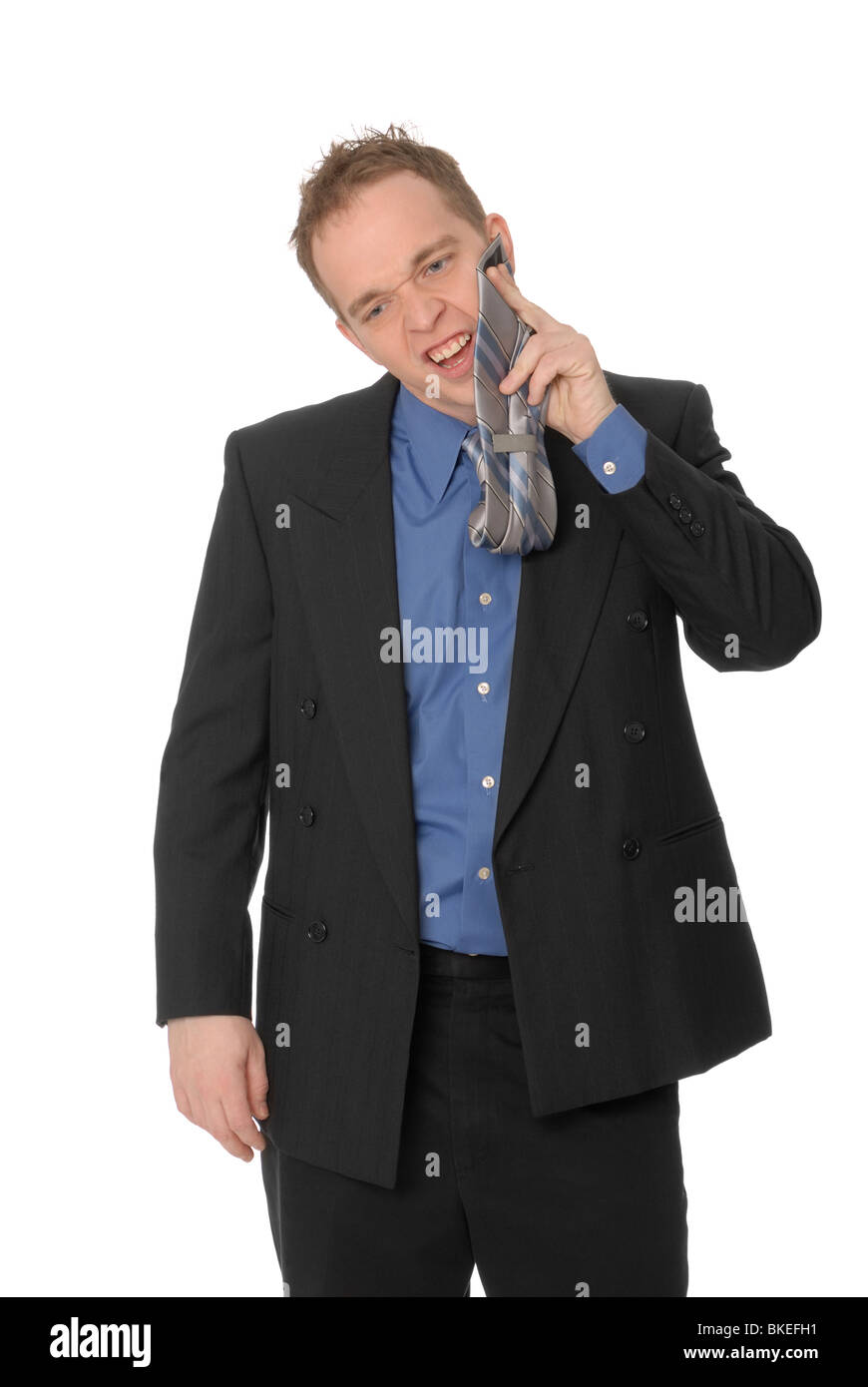 Business man tergi il suo volto con la cravatta, nervoso o cattive maniere. Foto Stock