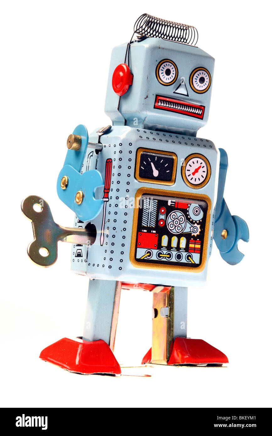 Giocattoli, robot sono costituiti di metallo, wind-up robot con un tasto  nella parte posteriore Foto stock - Alamy