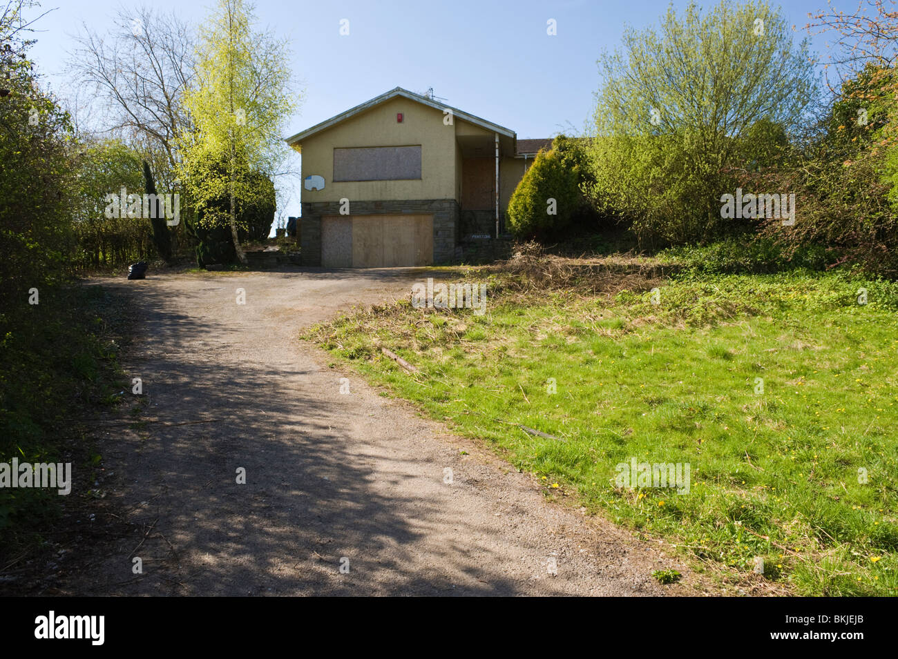 Grosse staccate intavolato bungalow in ambiente rurale South Wales UK Foto Stock