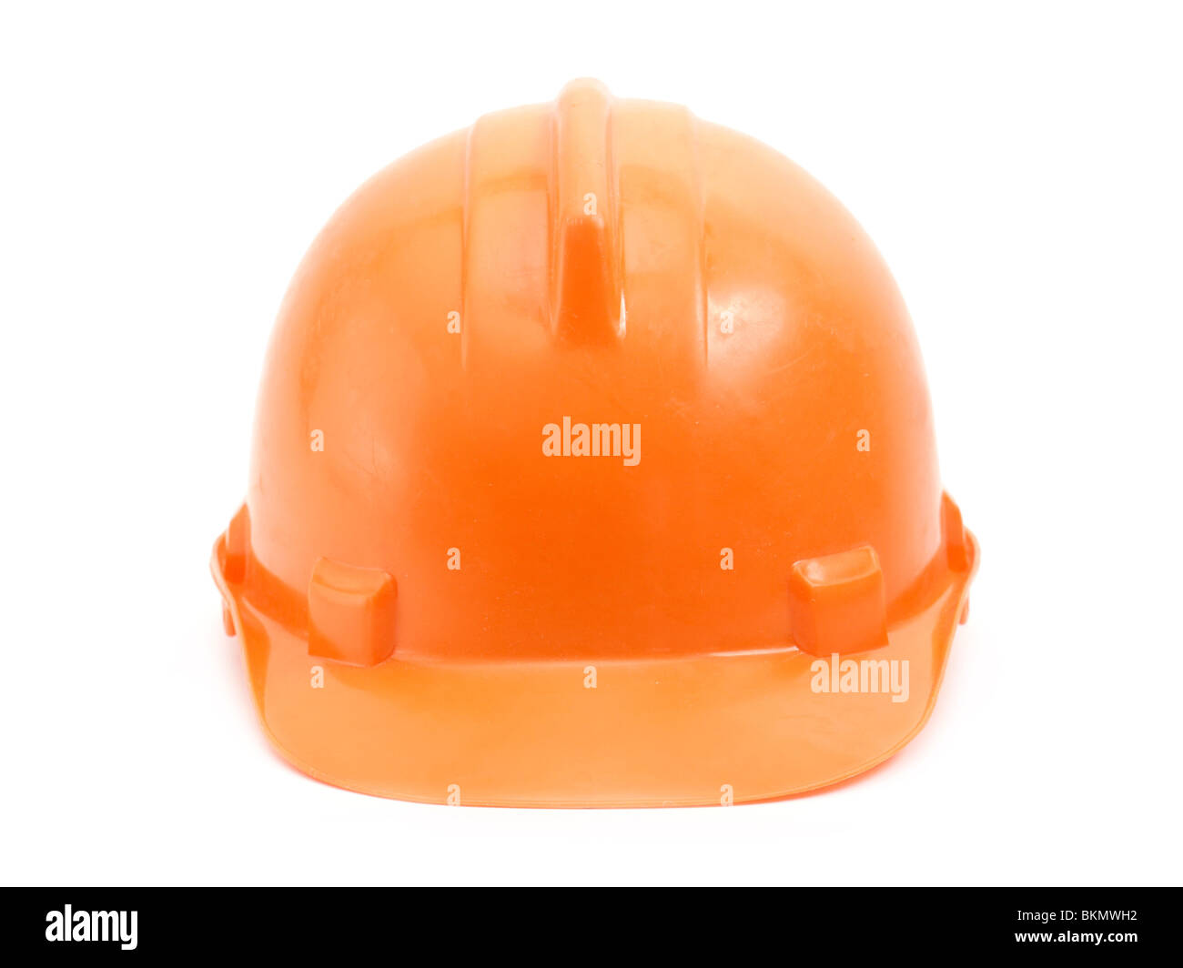 Arancione casco di sicurezza su sfondo bianco Foto Stock