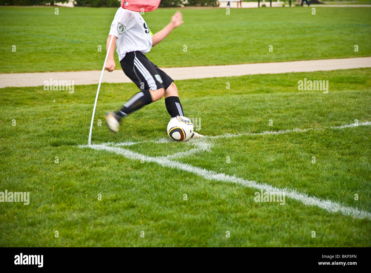 Calcio Calcio Calcio d'angolo per il gioco della palla piede della gioventù piedi Foto Stock