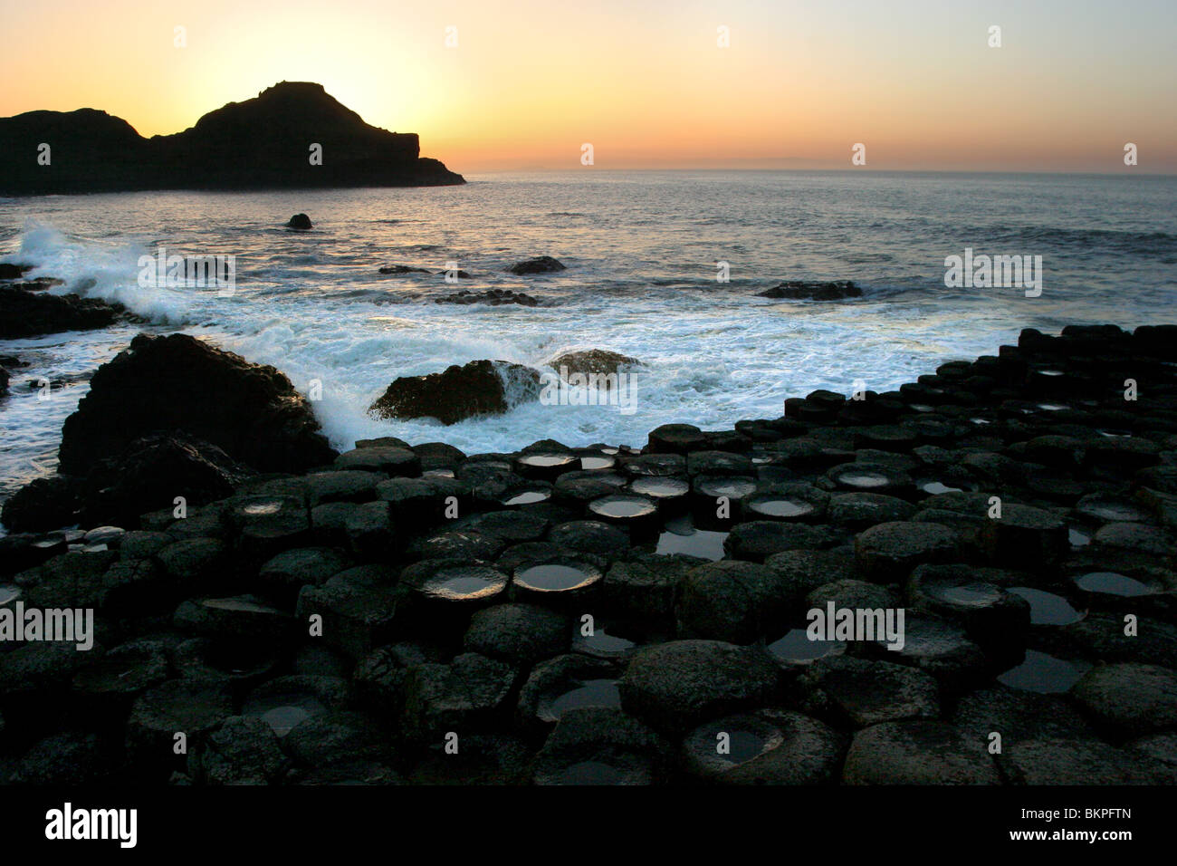 Giant's Causeway tramonto in inverno Foto Stock