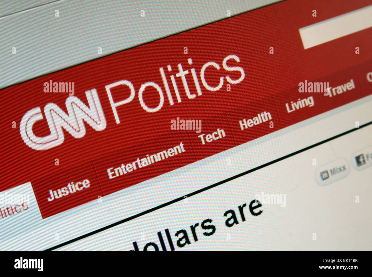 Una parte inclinata o close up screen shot della pagina Politica del CNN sito web. Aprile 2010 Foto Stock