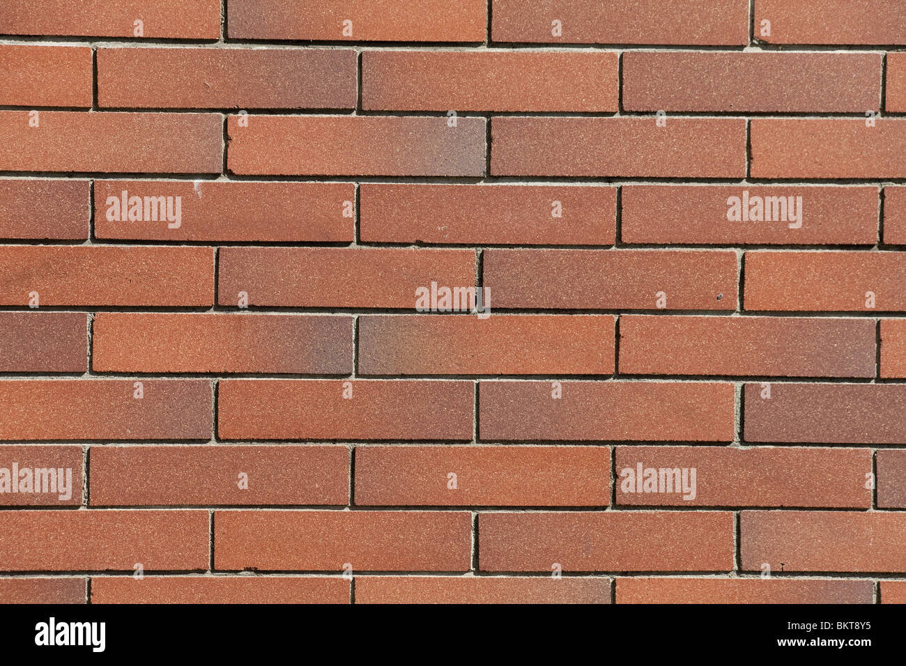 Rosso di un muro di mattoni per lo sfondo Foto Stock