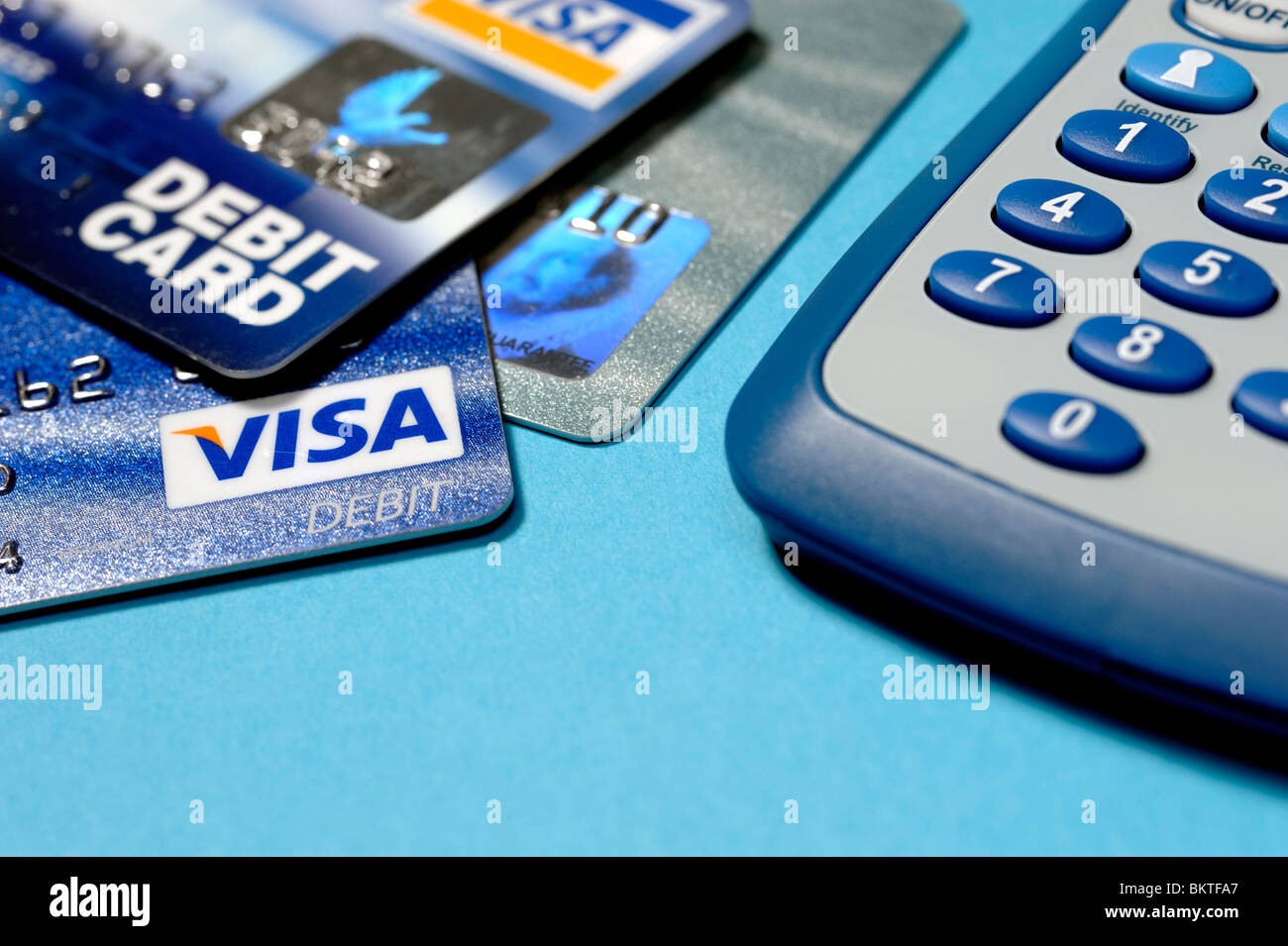 Carte di credito e calcolatrice Foto Stock