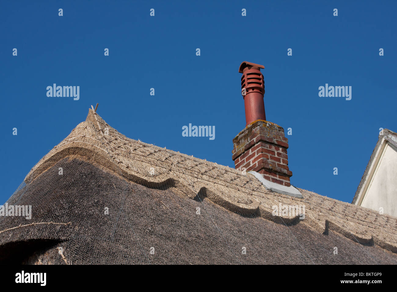 Un nuovo tetto di paglia in Wendens ambone, Essex Foto Stock