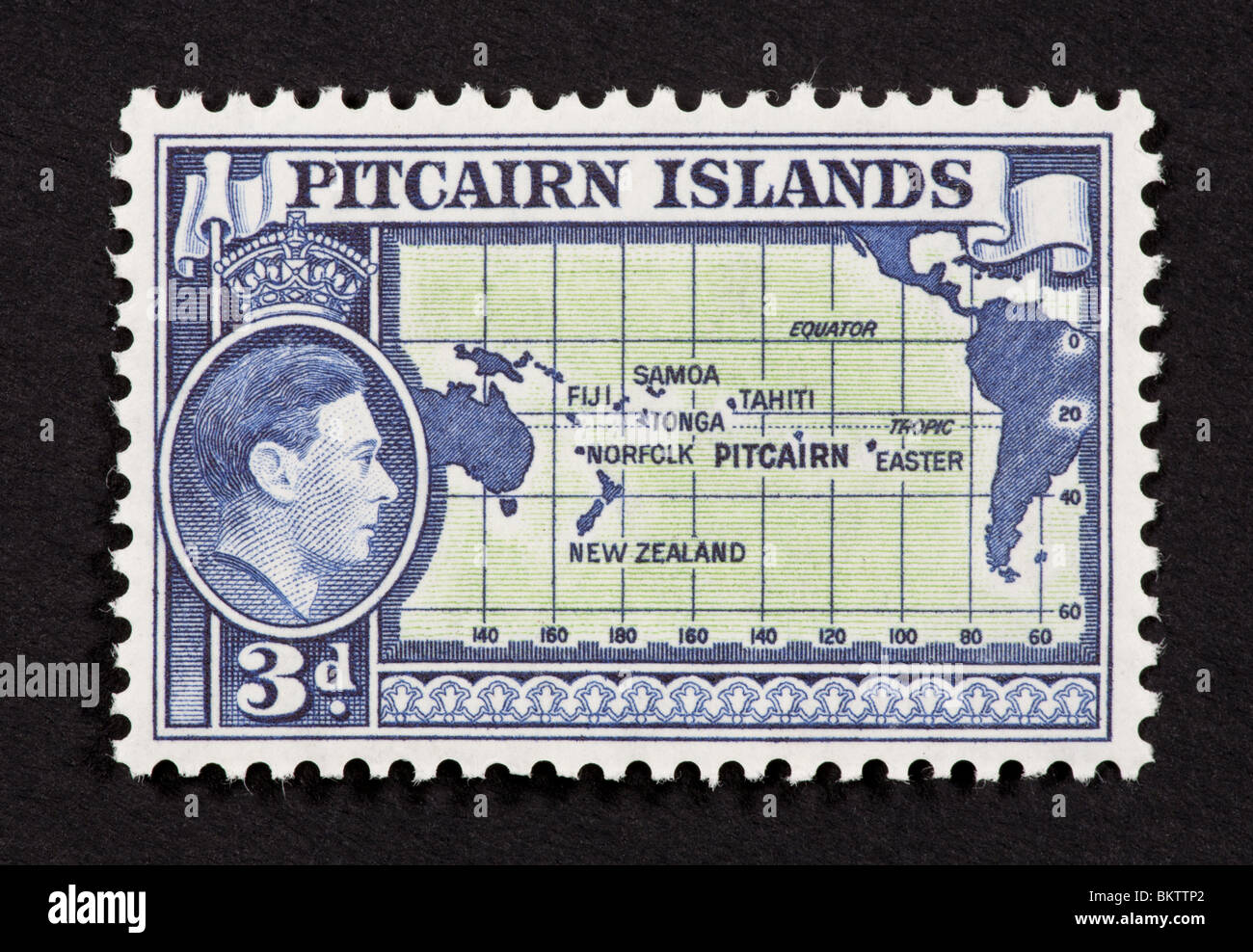Francobollo dalle Isole Pitcairn raffiguranti George VI e una mappa delle isole. Foto Stock