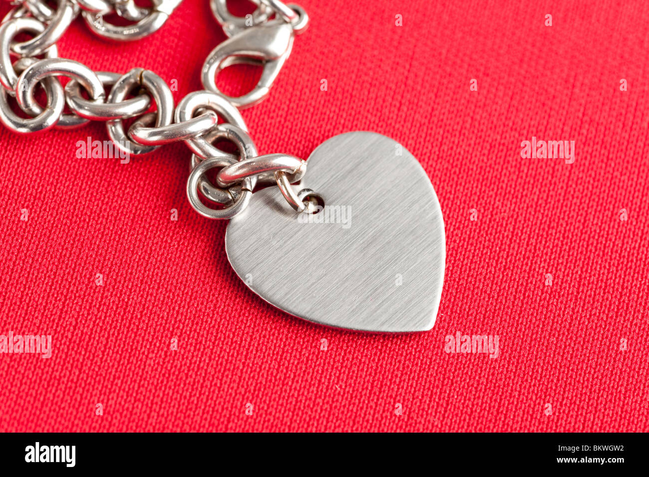 Catena e forma di cuore close up Foto Stock