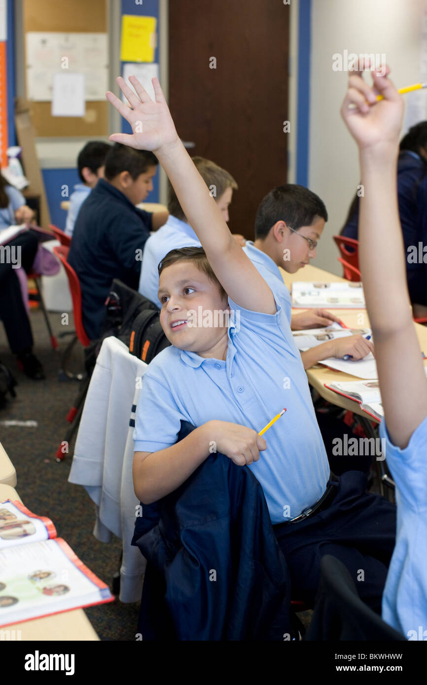 Studenti delle scuole medie nella loro classe alla Peak Preparatory Academy di Dallas, Texas. ©Bob Daemmrich Foto Stock