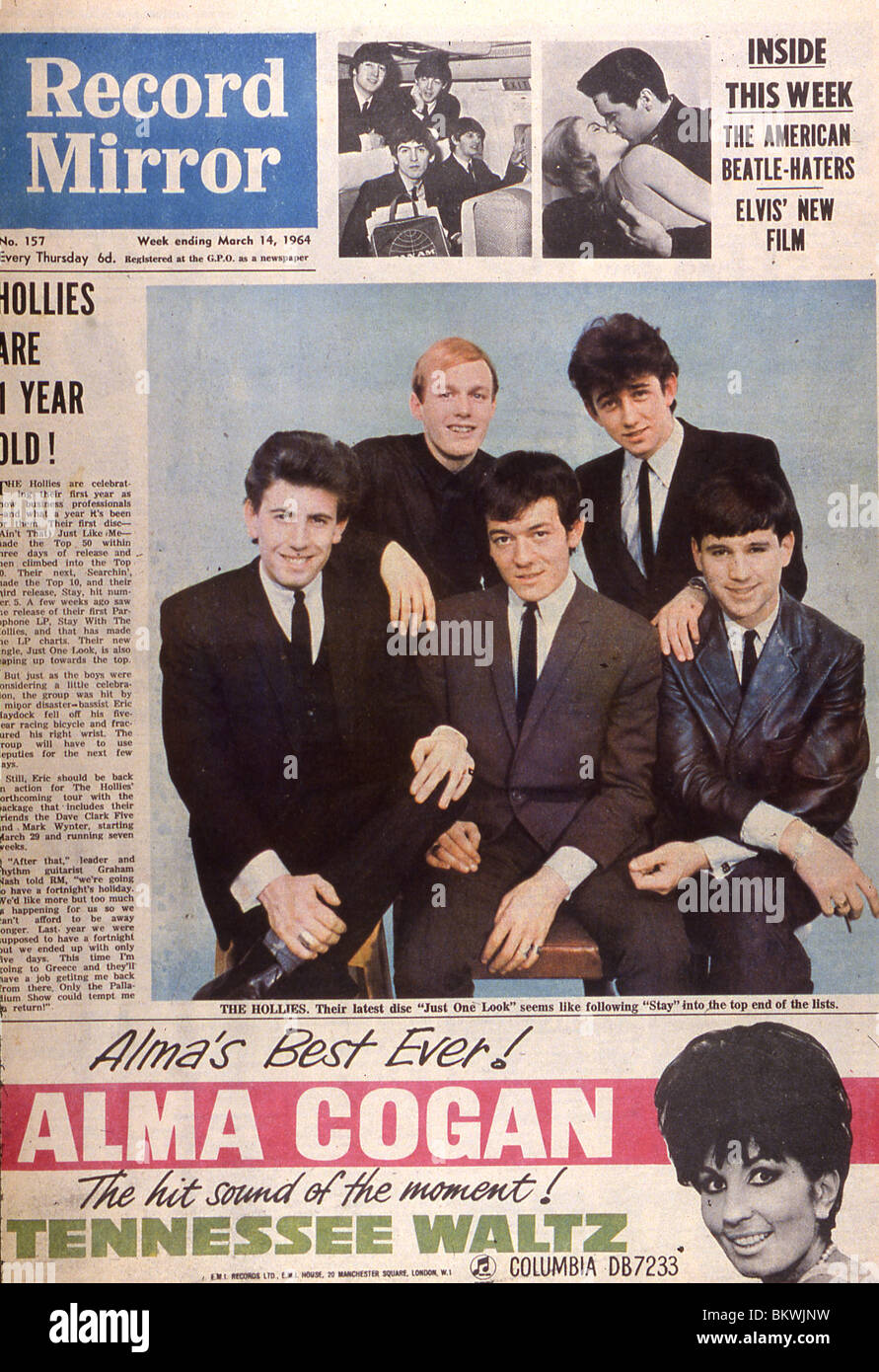 HOLLIES coperchio anteriore della rivista britannica registrare uno specchio  per 14 Marzo 1964 per celebrare il gruppo del primo anno insieme Foto stock  - Alamy