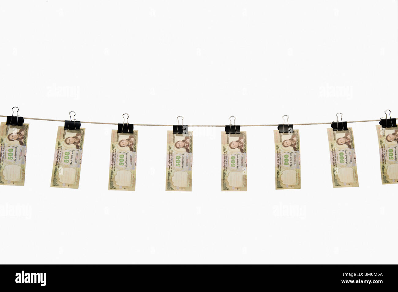 Moneta note su stendibiancheria per asciugare Foto Stock