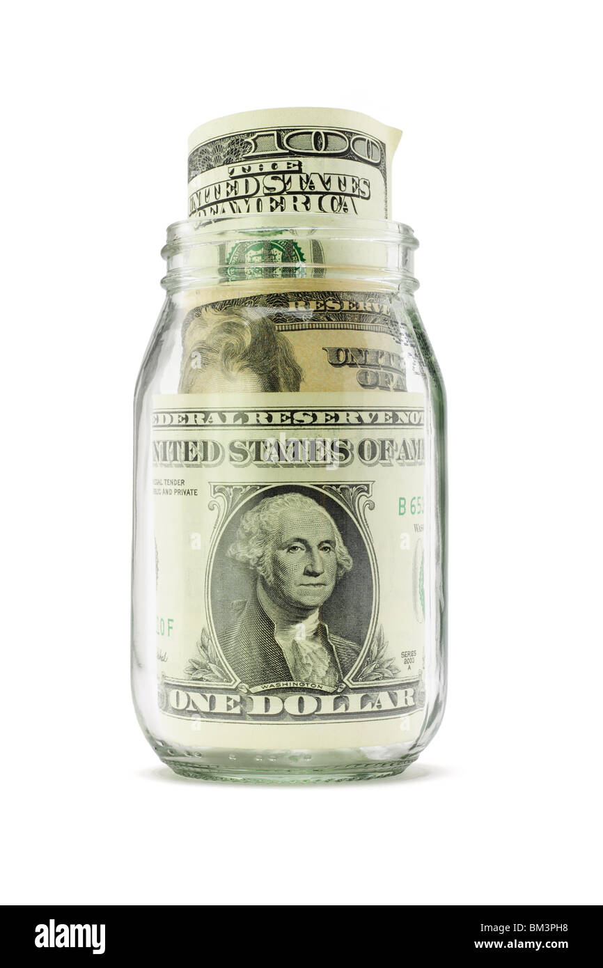 US dollar note in aprire il vasetto di vetro su sfondo bianco Foto Stock