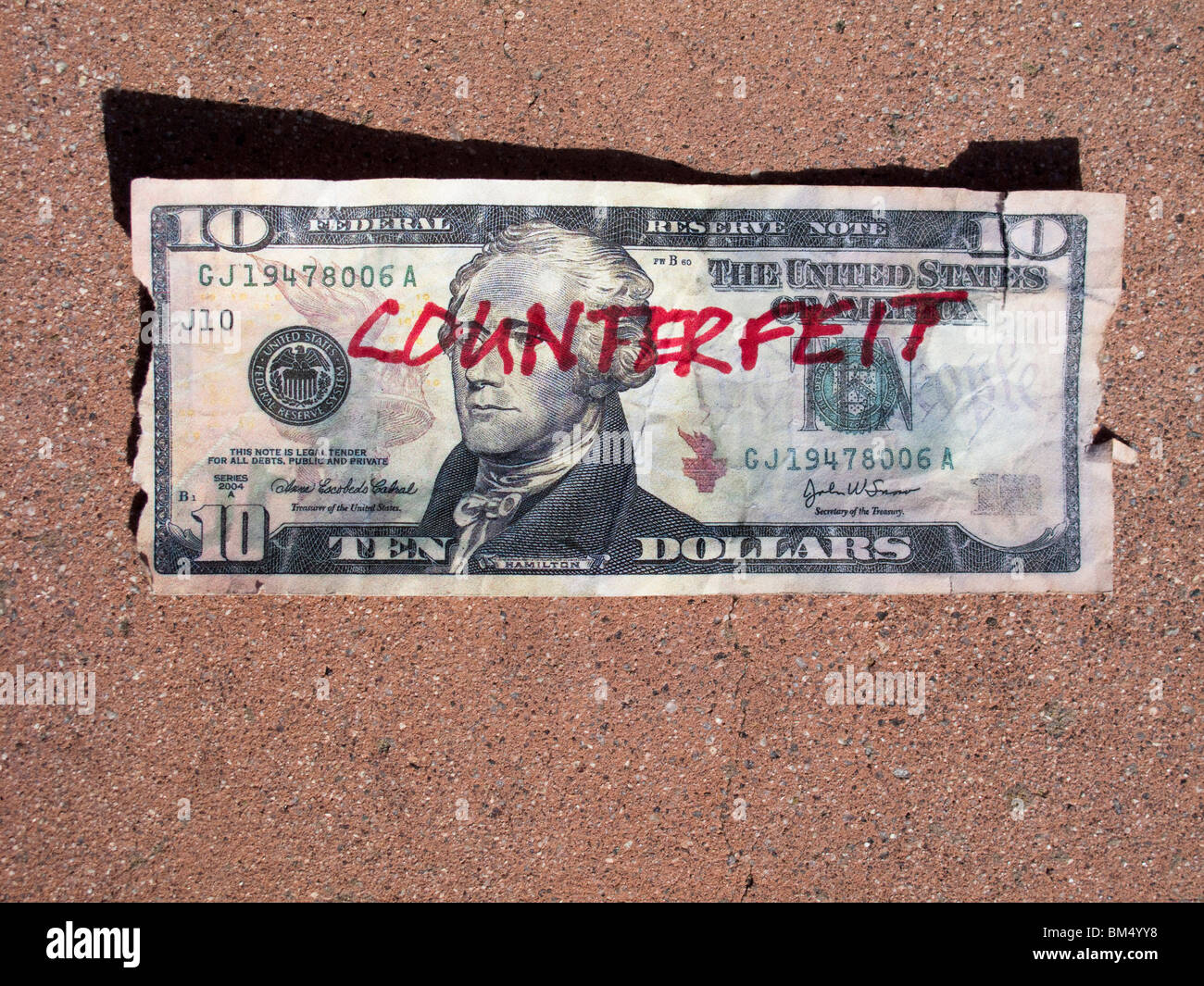 Un contrassegnati chiaramente contraffatta ten-dollaro. Foto Stock