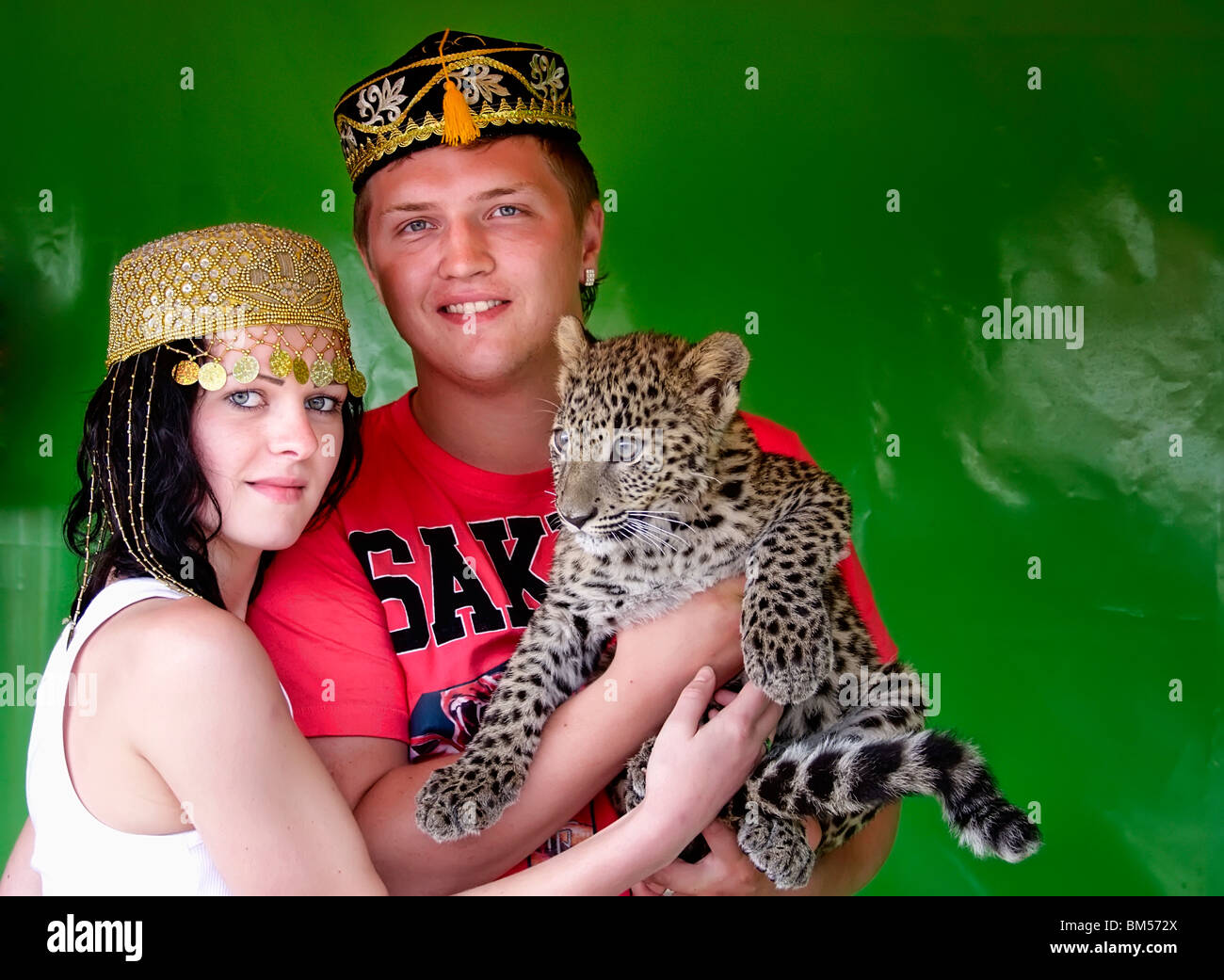 Ritratto di persone con un leopard Foto Stock